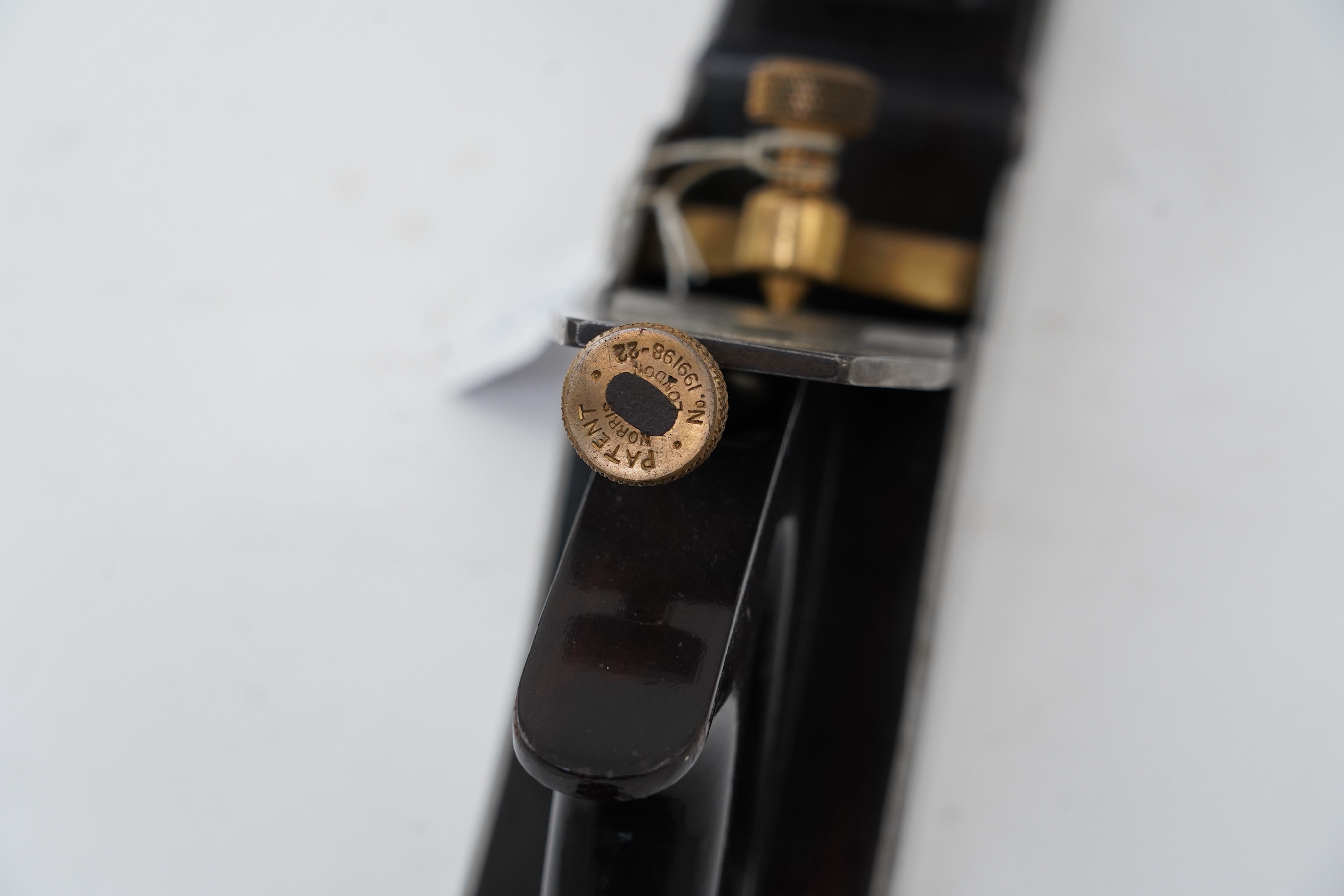 A Norris A1 adjustable 22 1/2” jointer plane with rosewood infill and handle, stamped with Norris, London to both the brass lever cap and the iron